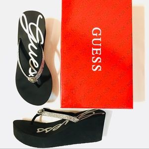 Guess platform flip flops